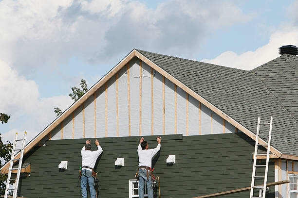 Professional Siding technician working in Harrisville, WV